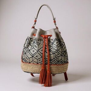Big Buddha geometric woven bucket bag gray faux leather trim orange tassels boho